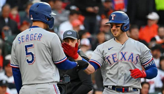 rangers blow past orioles to go home