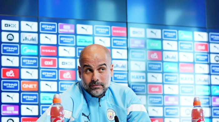 furious guardiola held back from confronting fan